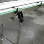 Transport pas à pas de plateaux d’œufs