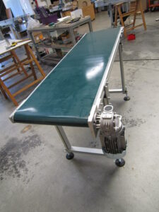 convoyeurs à tapis lisse